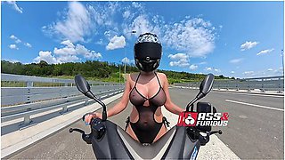 Riding Motorcycle In See Through Beach Wear