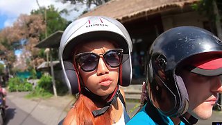Thai beauty with natural tits and glasses indulges in a steamy al fresco BJ session