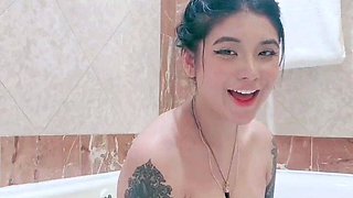 Busty babe playing with her big boobs