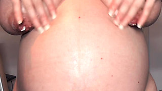 Rubbing Lotion Into 38 Week Pregnant Bump & Big Tits