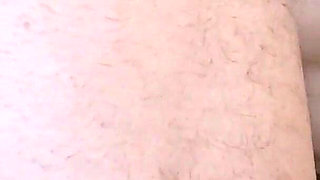 MILF with Sunglasses Gives a Blowjob and Gets a Cumshot in Her Mouth