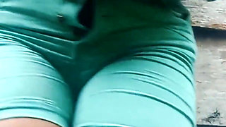 Desperate for a Pee Bouncing in Green Short Weeing Outdoors