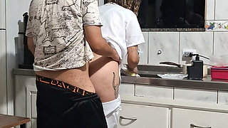 Banging the maid from behind in the kitchen.
