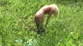 Blonde Babe Fingers Herself Deep in Forest