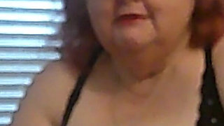 Mature BBW Redhead Nurse Vicki Talks to You as She Makes a Lipstick Applying Video for You!